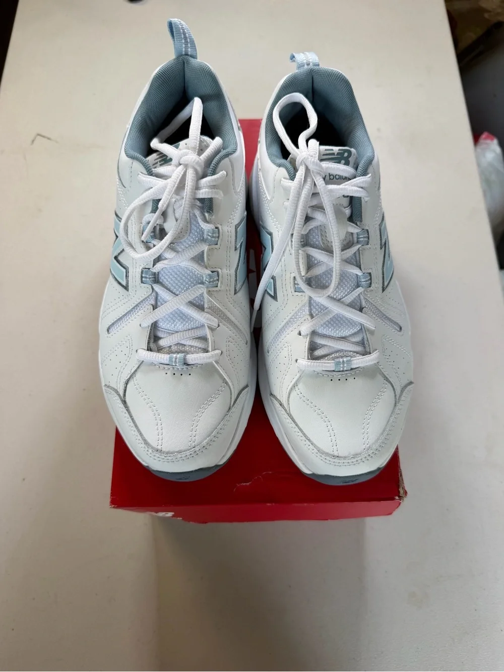 New Balance White and Light Blue Athletic Sneakers